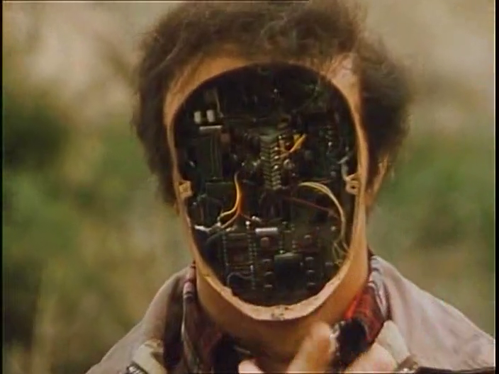 There it is! The first “Behind the Face, the Computer” scene on television. There it is! The first “Behind the Face, the Computer” scene on television.