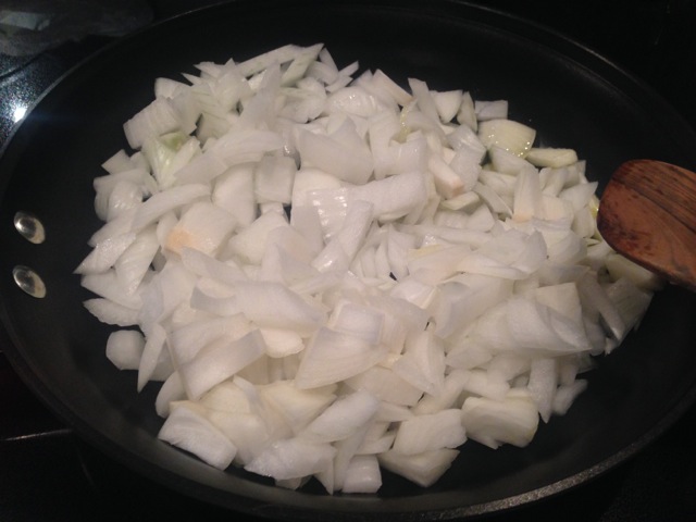 4 cups onions, 3 Tbsp olive oil, being stirred in non-stick skillet. 4 cups onions, 3 Tbsp olive oil, being stirred in non-stick skillet.