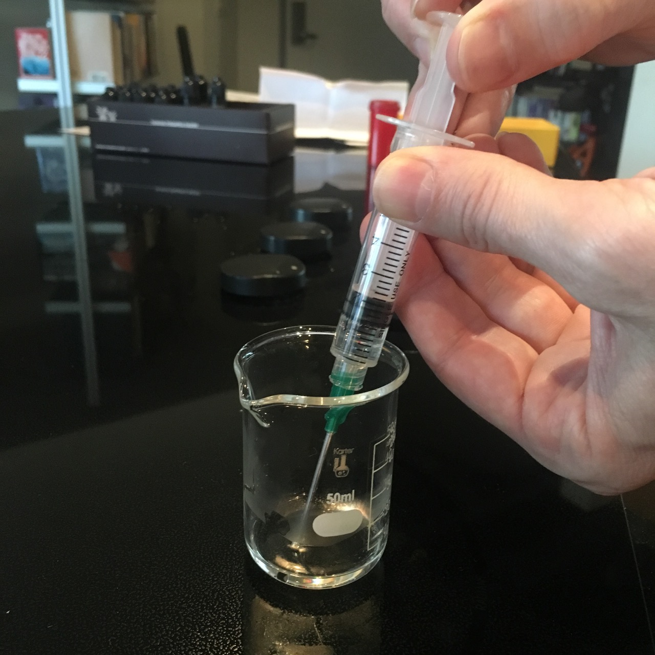 Suck a tiny bit into your syringe. Suck a tiny bit into your syringe.